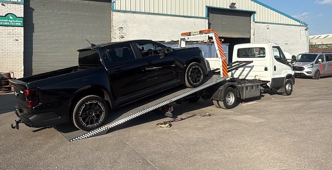 Glasgow Breakdown Recovery flatbed truck loading a Ford Ranger
